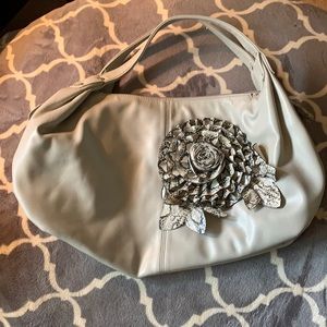 B. Lush Handbag with Flower